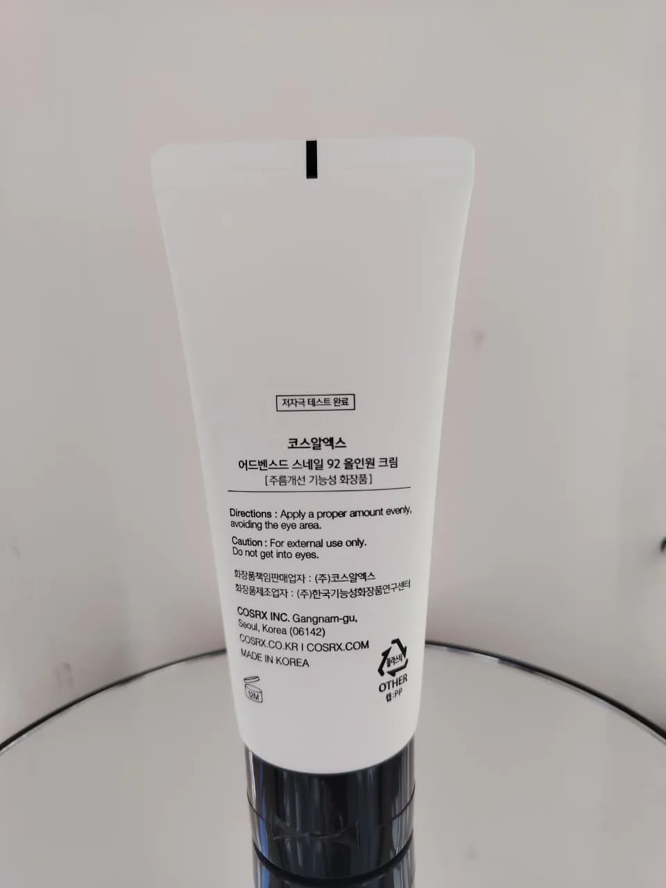 Back of COSRX Snail 92 cream showing ingredients and instructions